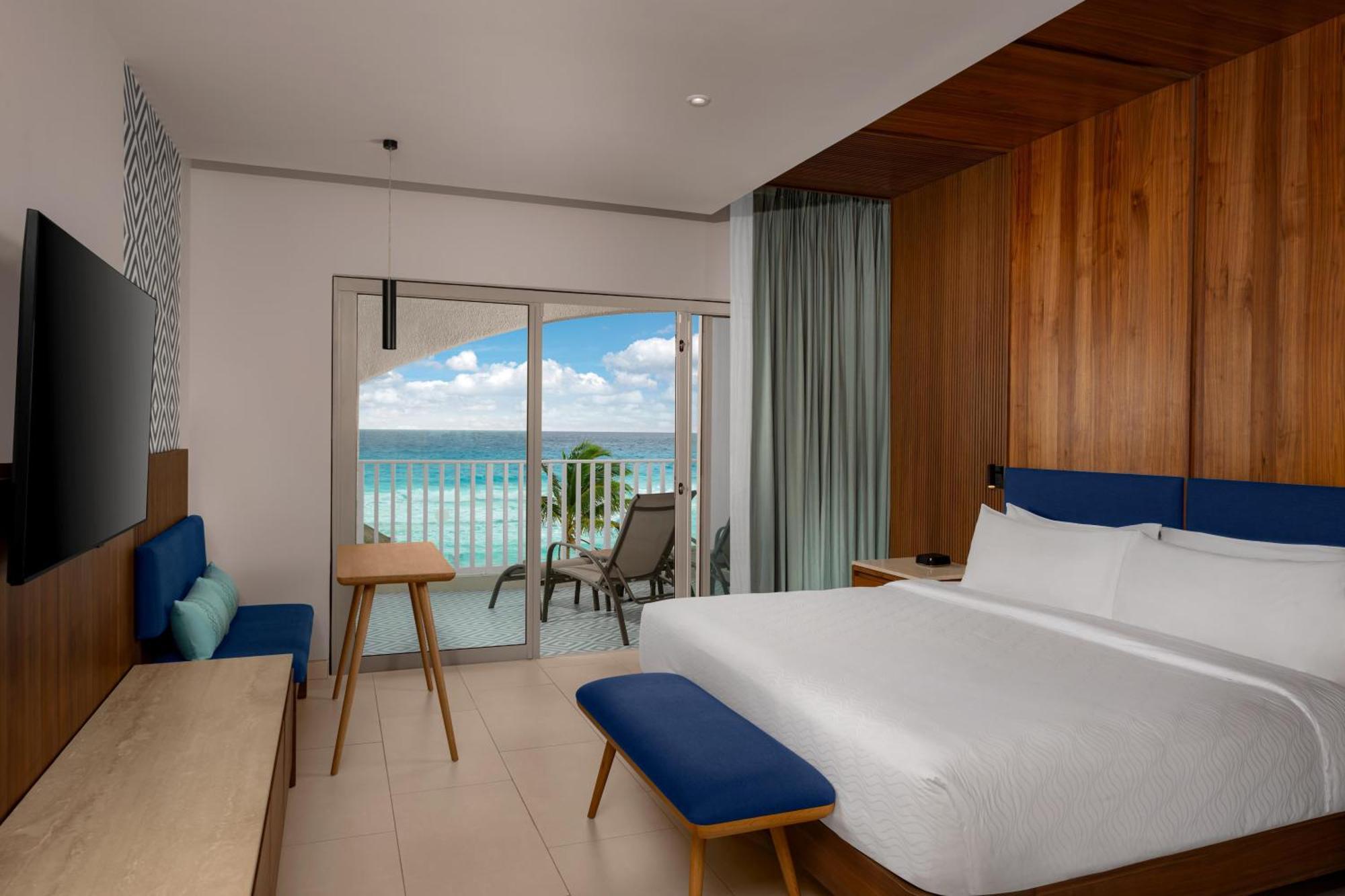Habitación Enclave frente a la playa con terraza y cama extragrande